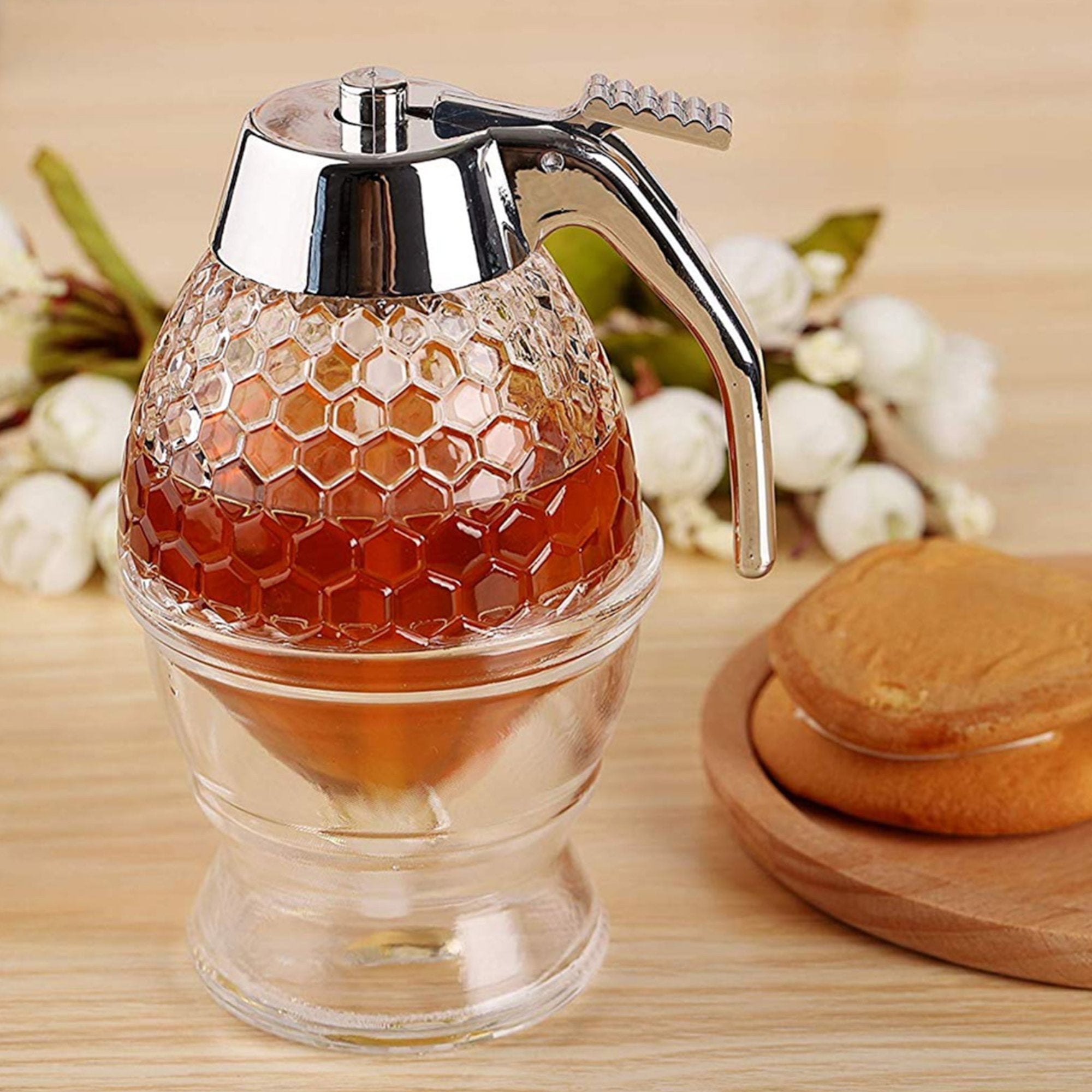Praktični dozer za med i sirup