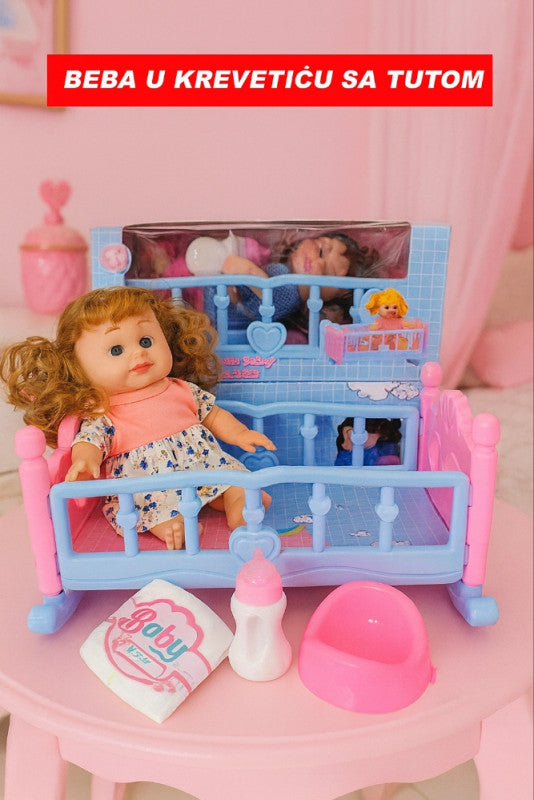 Beba u krevetiću sa tutom – komplet za njegu i igru!